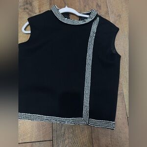 St. Andrew’s wool top. 12